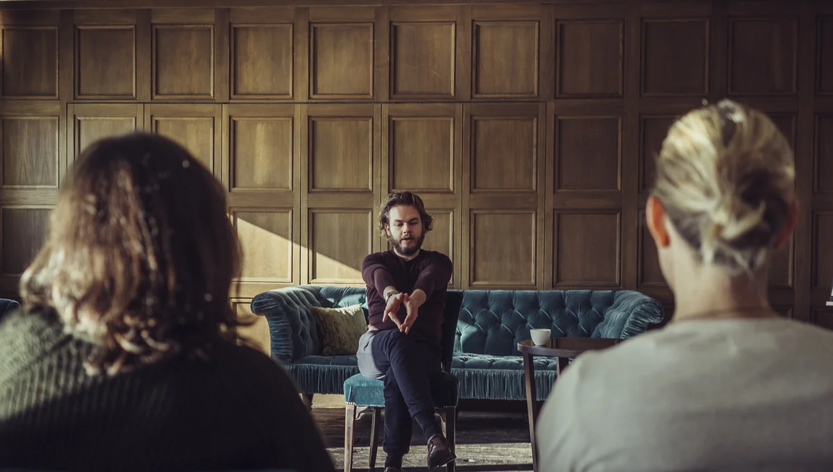 Nicolas Matt speaking to a group